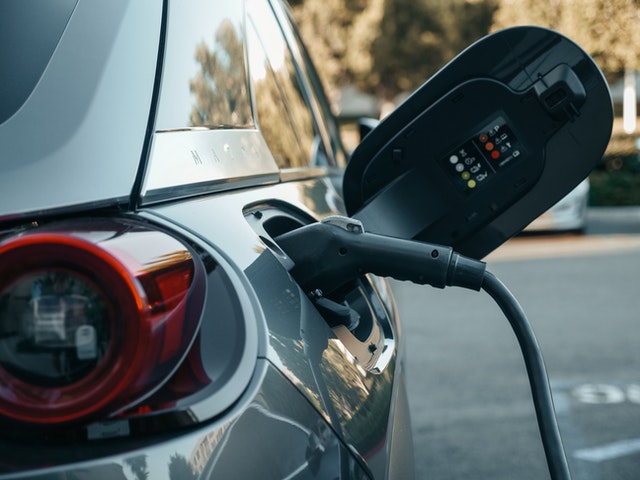 Gasoline Car being pumped